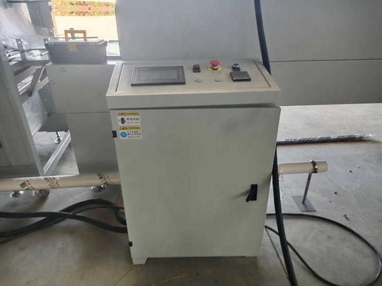 PLC control system for automatic shrink wrapping machine