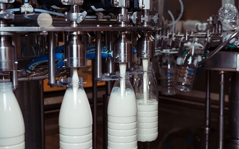 Isolated aseptic filling unit for liquid milk and dairy beverages