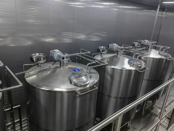 Heated stainless steel honey storage tank before filling