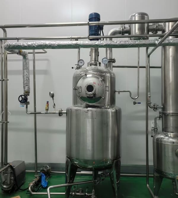 Vacuum concentration system for honey moisture reduction
